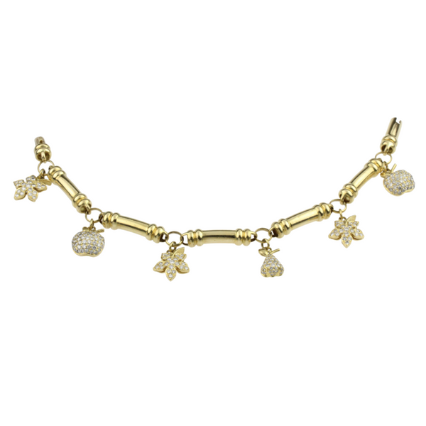 Brillantbettelarmband in 750er Gelbgold mit sechs Charms